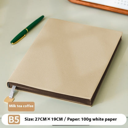 Litchi pattern soft leather covered notebook with textured finish and compact rectangular design