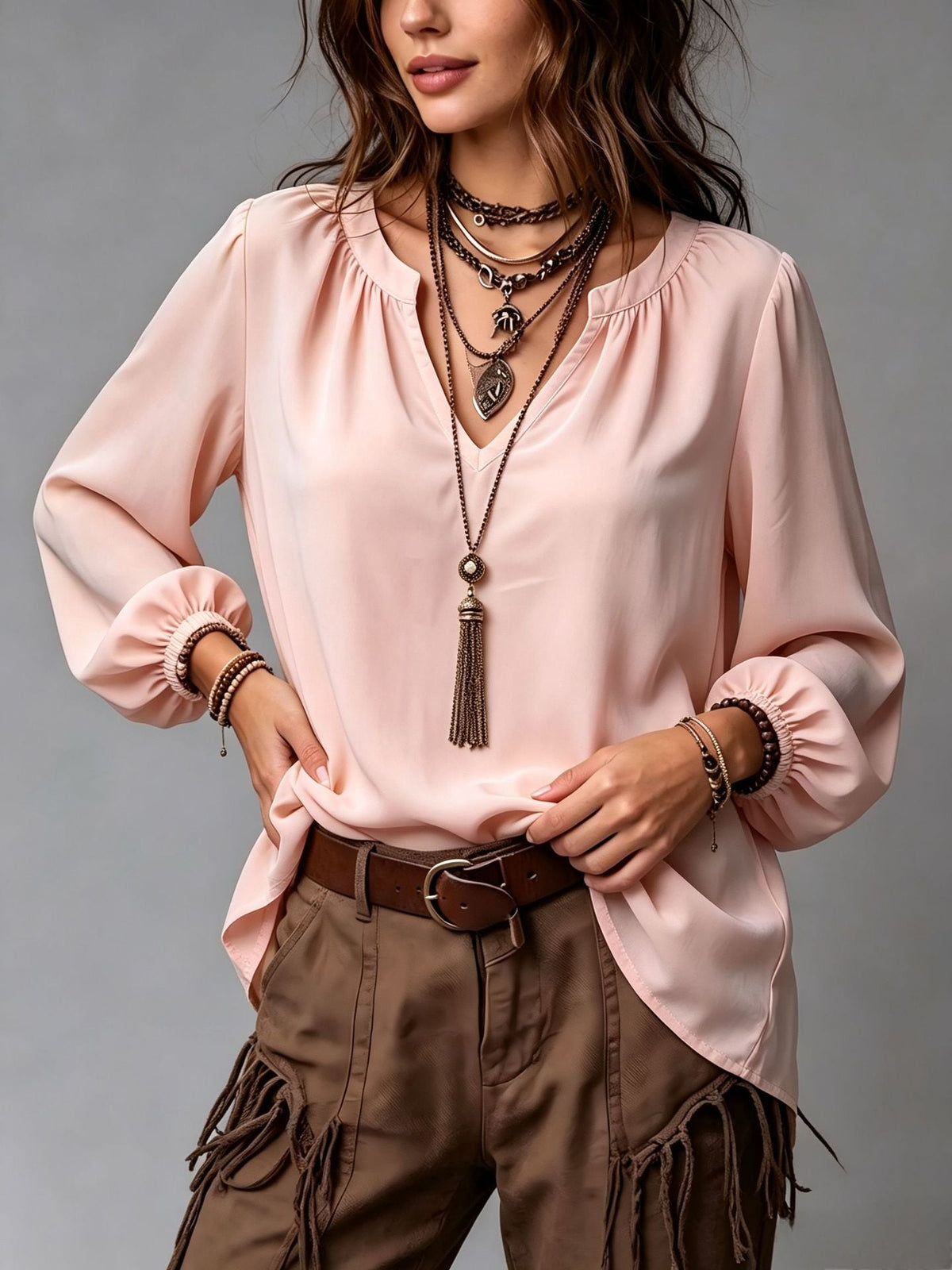 Women's elegant V-neck shirt with puff sleeves in a refined, feminine style