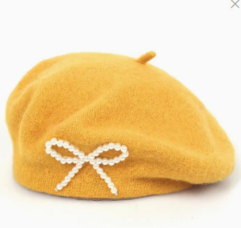 Pearl bow wool breathable beret in a soft, textured design with decorative pearl accents