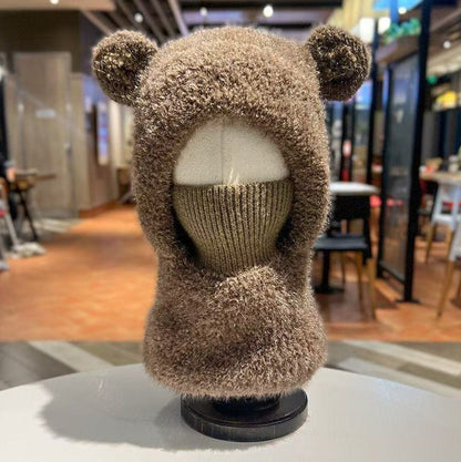 Warm windproof knitted wool hat with earflaps in a cozy winter design