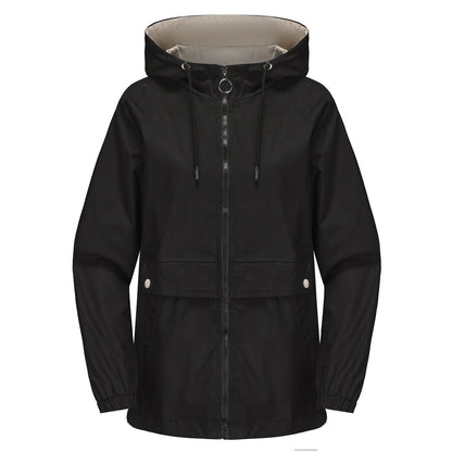 Women's hooded solid color trench coat in a classic longline design