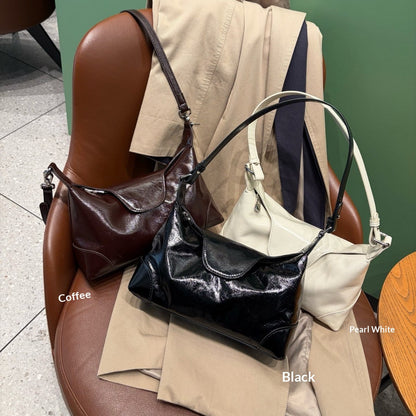 Top-grain oil wax cowhide dumpling bag, small genuine leather shoulder and crossbody bag in brown