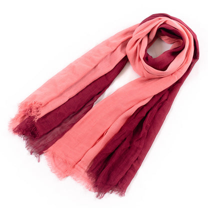 Large soft warm cotton scarf with tassel trim, displayed flat
