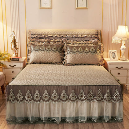 Quilted lace bed skirt bed liner in white, featuring decorative trim and a fitted design