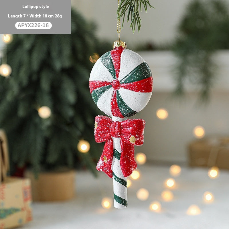 Painted plastic Christmas tree pendant decoration in festive holiday design
