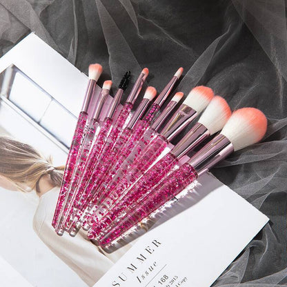 Set of 10 essential makeup brushes from BACKUPMYFILESNOW® including face, eye, and blush brushes arranged on a white background.