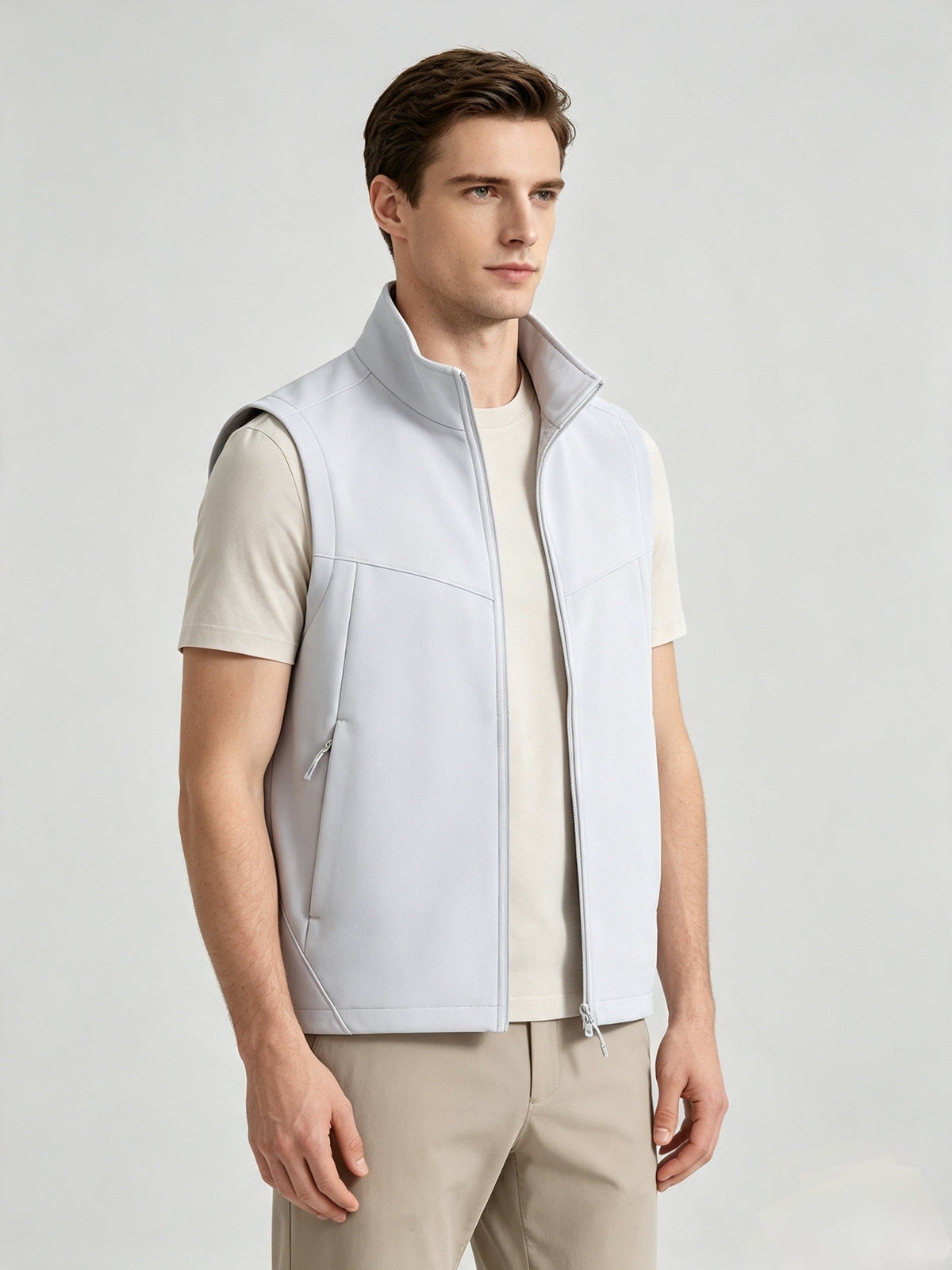 Men and women softshell vest with stand collar, zip front, fleece lining, and sleeveless outdoor design