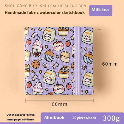 Square fabric watercolor notebook for art students, portable painting sketchbook, open page view