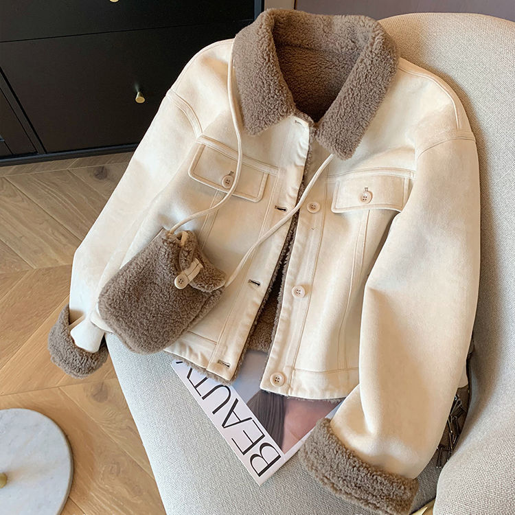Women's loose thick small fur coat in plush texture, front view