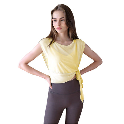 Women’s summer 2-piece yoga outfit with short sleeve mesh top and built-in bra pads over fitness shorts