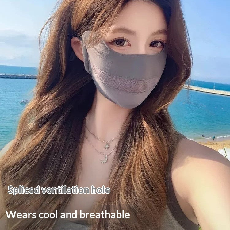 Women's sun-protective UV face mask in black with ear loops and breathable fabric