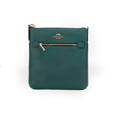 Dark pine leather Coach Rowan Mini crossbody bag with a compact design, featuring a sleek and stylish look.