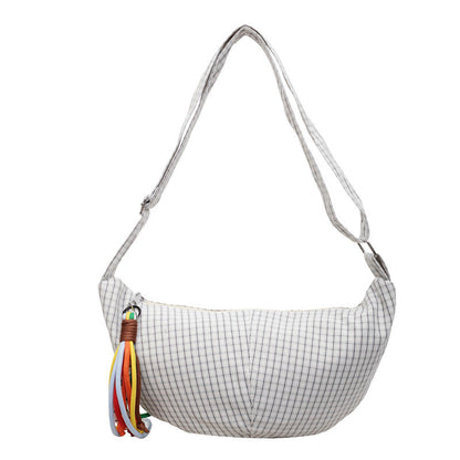 Large-capacity casual niche-style crossbody bag for students, spacious everyday shoulder bag in close-up view