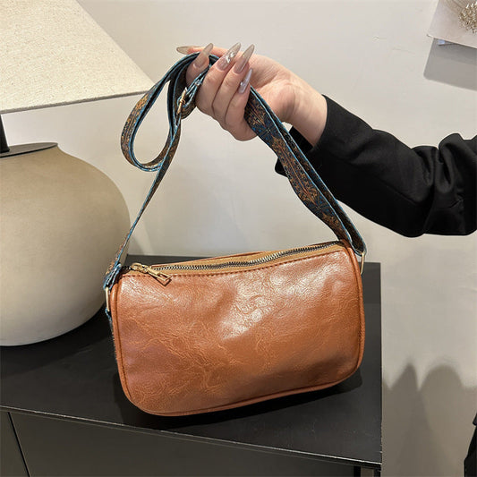 Women's vintage wide strap crossbody Boston pillow handbag with versatile shoulder carry design