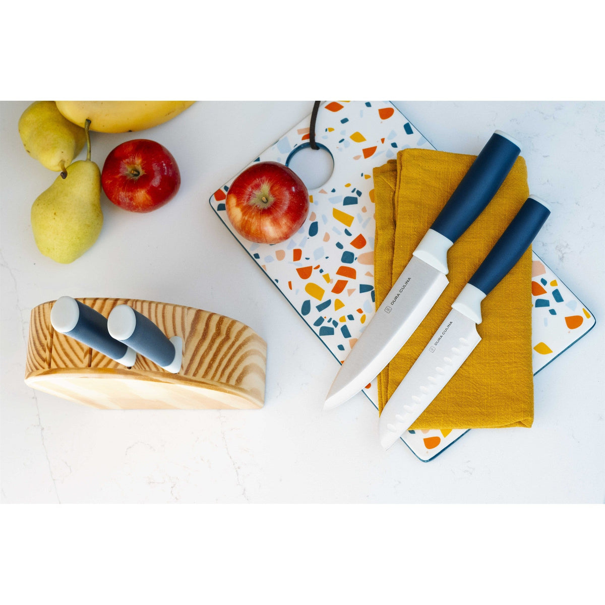Dura Living DUO-GRIP 5-piece kitchen knife starter set with stainless steel blades and ergonomic handles on a kitchen counter.