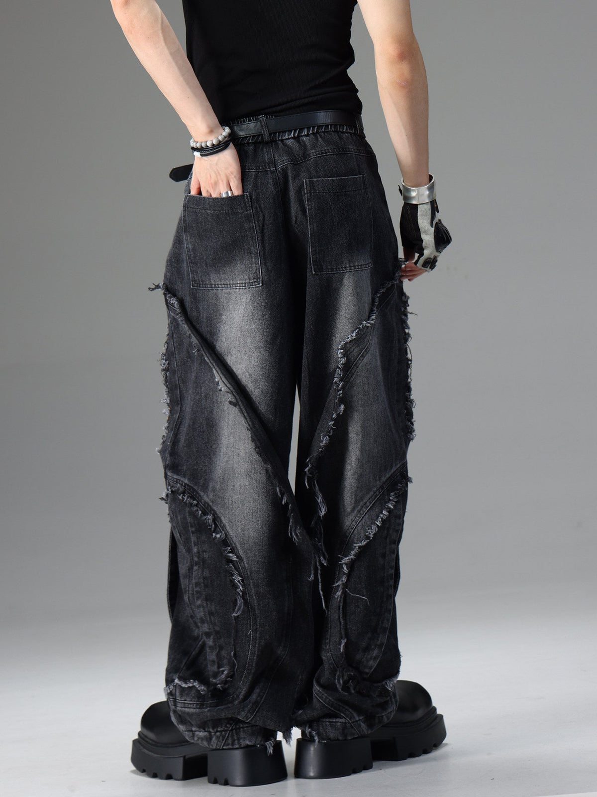 American-style vintage deconstructed distressed jeans with rugged denim finish and worn detailing