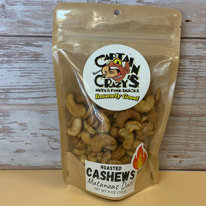 Roasted cashews with Matanzas Datil Pepper from Captain Crazy's Nuts and Fine Snacks, displayed in a bowl with a spicy seasoning.