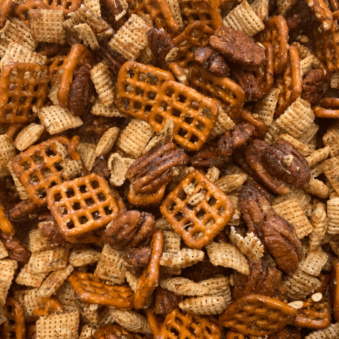 Captain Crazy's Snack Mix with sweet, spicy, and crunchy nuts in a colorful bowl, showcasing the bold, heat-infused flavors.
