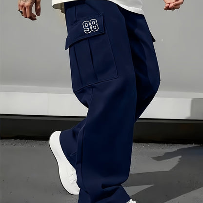 Men's loose fit work pants with drawstring waist, shown in a neutral solid color
