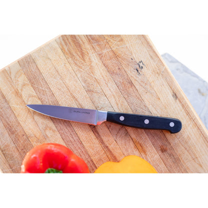 Dura Living Superior 3.5 inch black paring knife with a sleek handle and sharp blade for precise kitchen slicing.