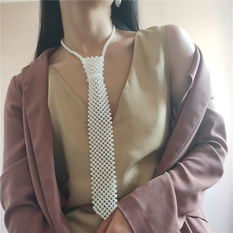 Pearl tie body chain with hollow-out handmade retro design, shown in detail