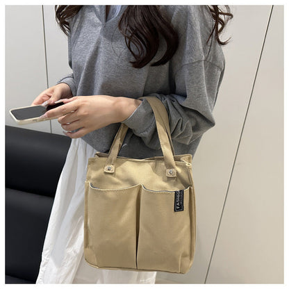 Plain-colored tote bag student lunch box in a simple solid-color design