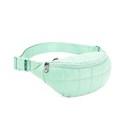 Solid-color casual crossbody waist bag with quilted diamond pattern and adjustable strap