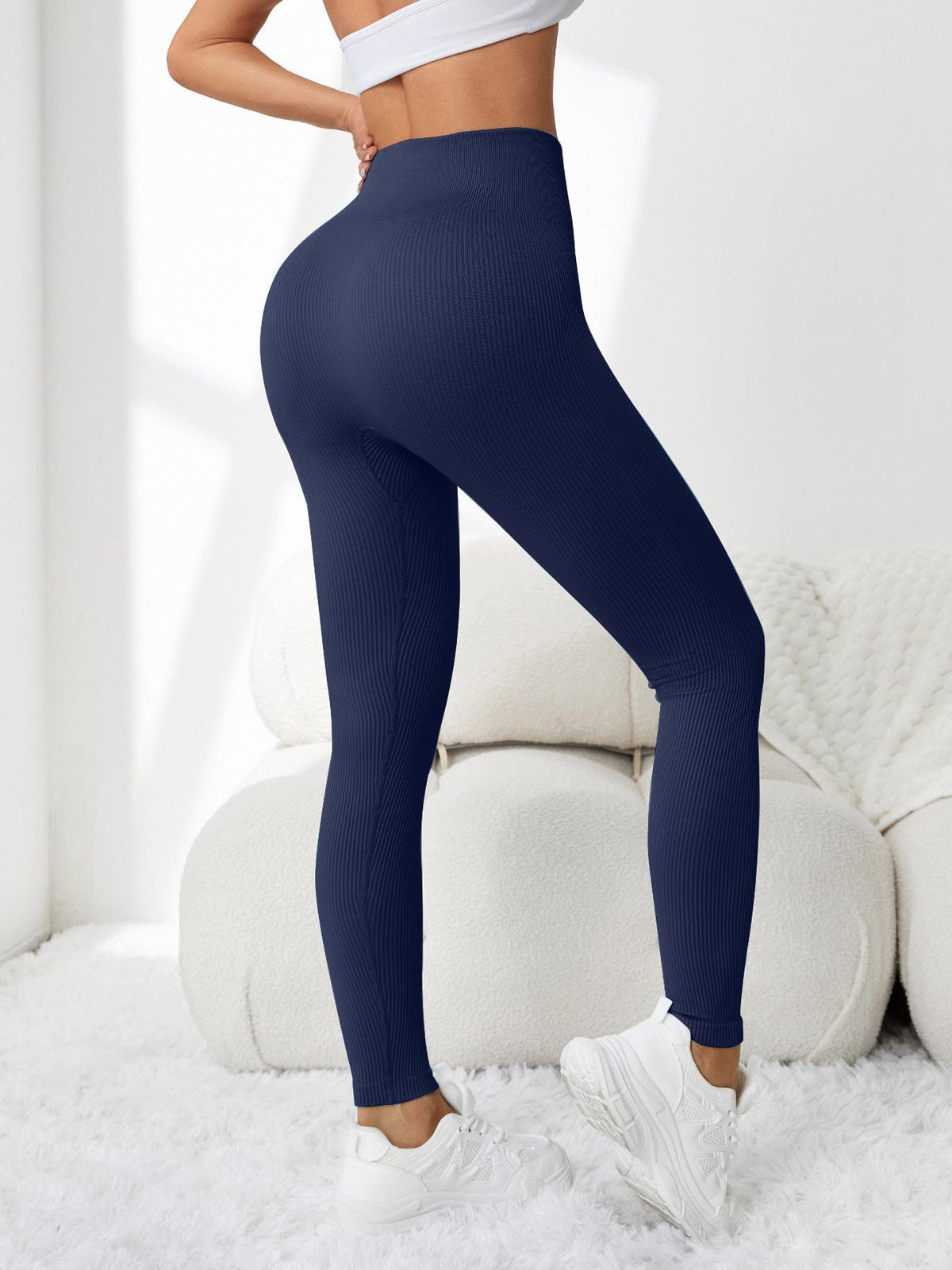 Women's high-waisted tight-fitting butt-lifting yoga pants in a sleek, sculpting design