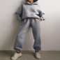 Women's BACKUPMYFILESNOW® hooded tracksuit, featuring a comfortable hoodie and matching joggers in stylish athletic wear.