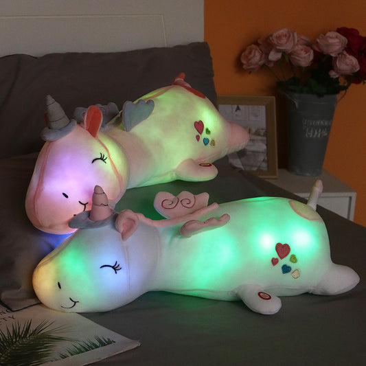 Glow-in-the-dark unicorn plush pillow toy by BACKUPMYFILESNOW® featuring soft fabric and a whimsical unicorn design.