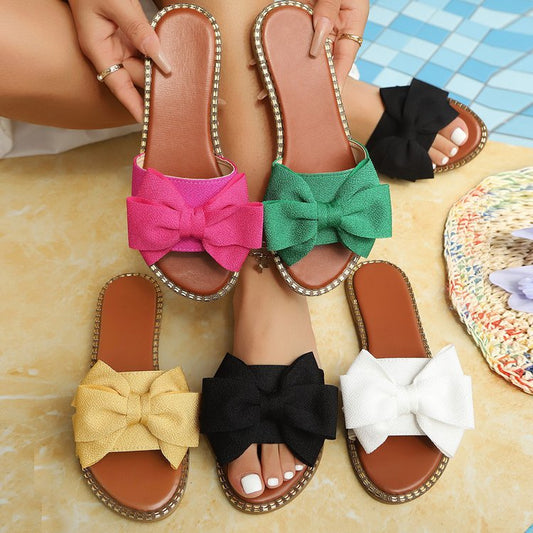 Colorful plus-size women’s bow-tie slippers with soft slip-on design
