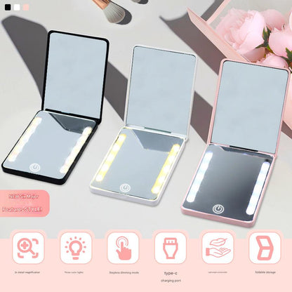 Compact double-sided folding makeup mirror with handheld design and LED light for touch-ups