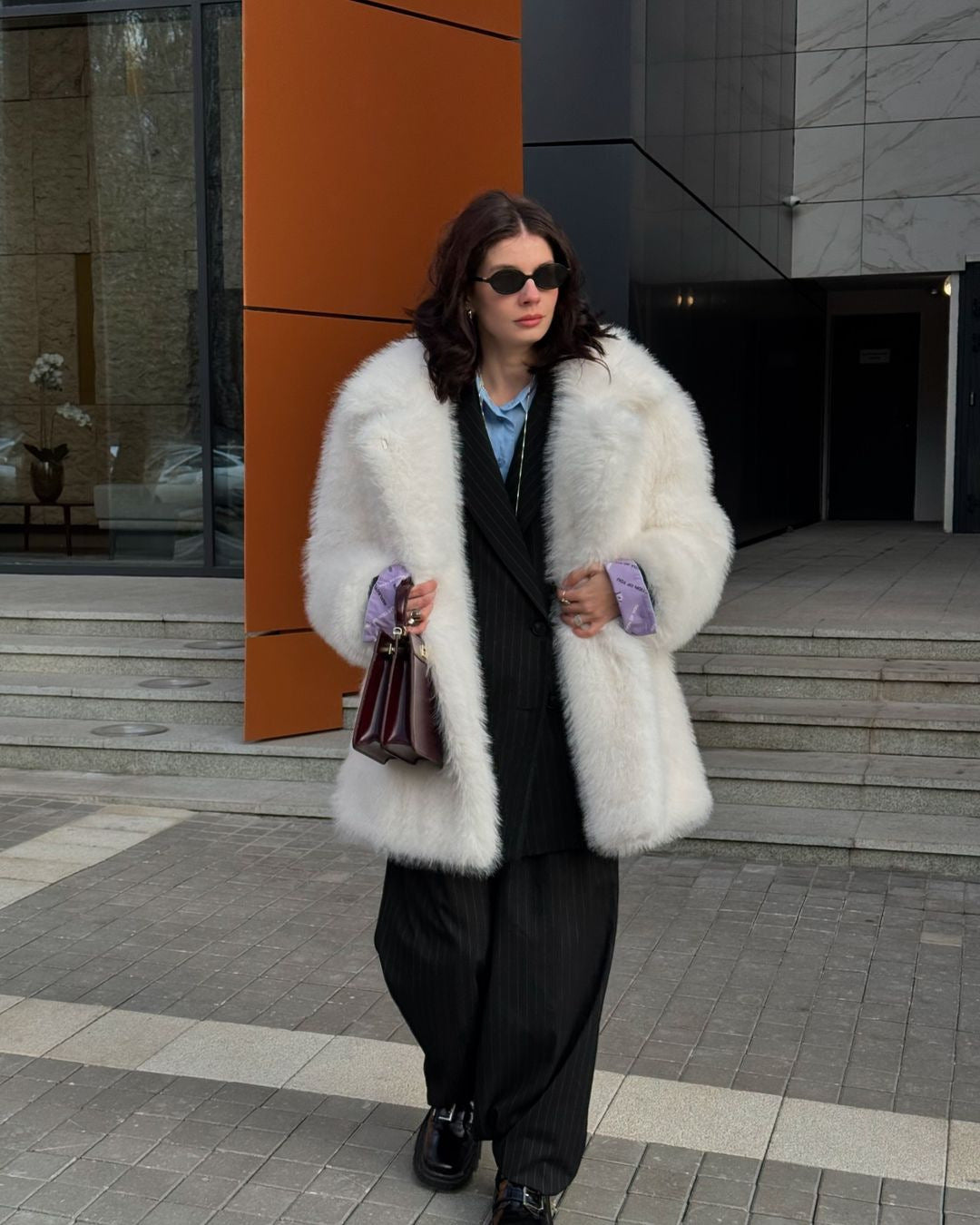 Women’s artificial fur warm coat, thick textured design in a cozy full-length style