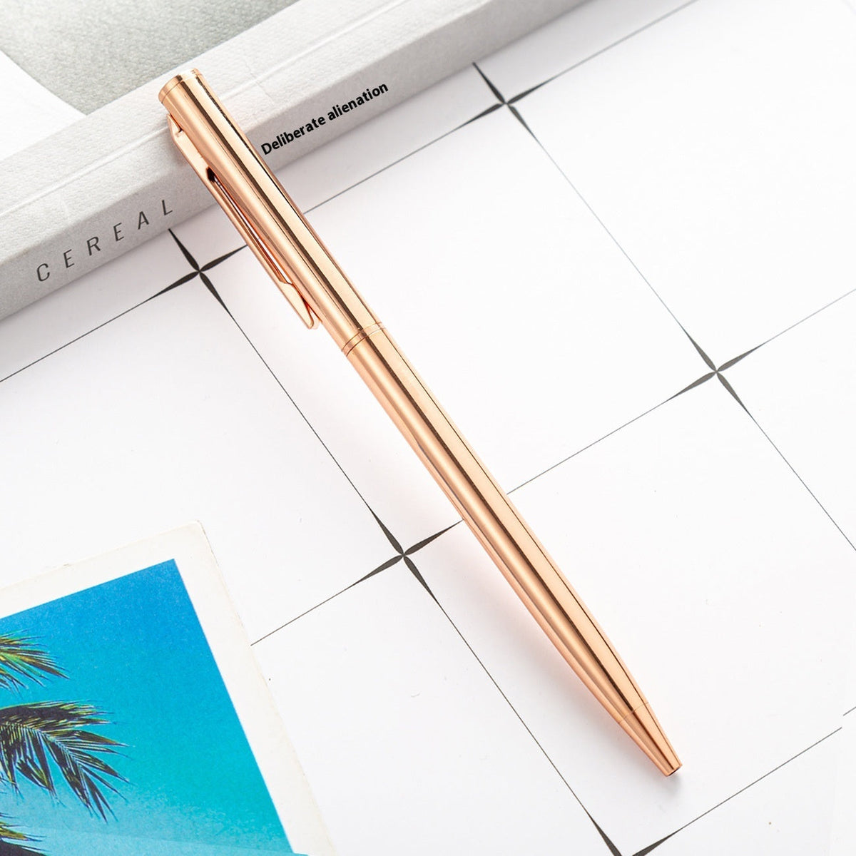 Little Gao Shi gold-plated ballpoint pen with a sleek metallic finish