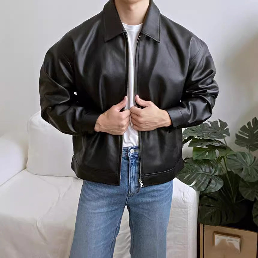 Leather casual baseball-style motorcycle jacket in black with snap front and ribbed collar