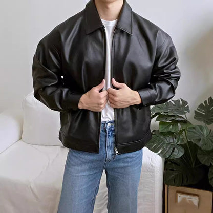Leather casual baseball-style motorcycle jacket in black with snap front and ribbed collar