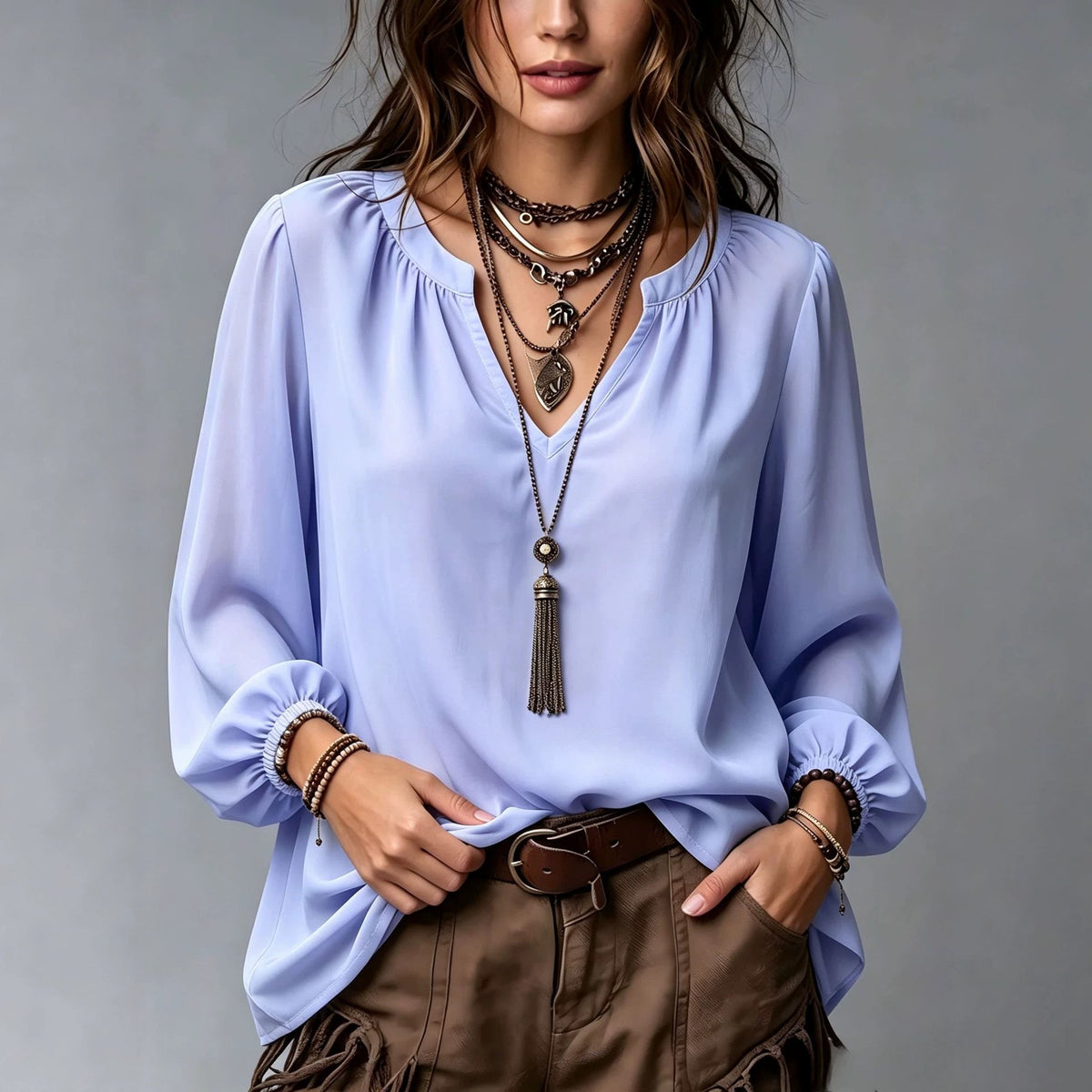 Elegant women's V-neck shirt with puff sleeves in a polished, feminine design