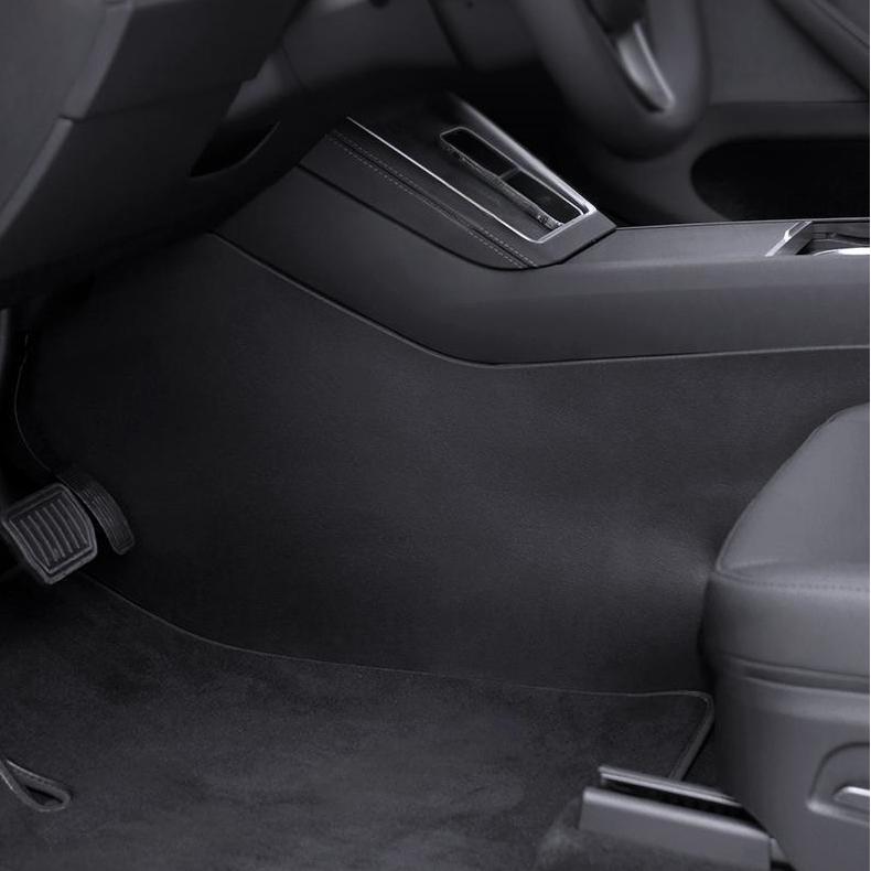 Pair of Tesery Model Y Juniper center console side anti-kick mats, protective covers for left-hand drive interior.