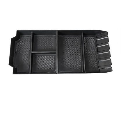 Cybertruck central storage box by Tesery Official Store, showing sturdy black plastic storage compartment inside the vehicle.
