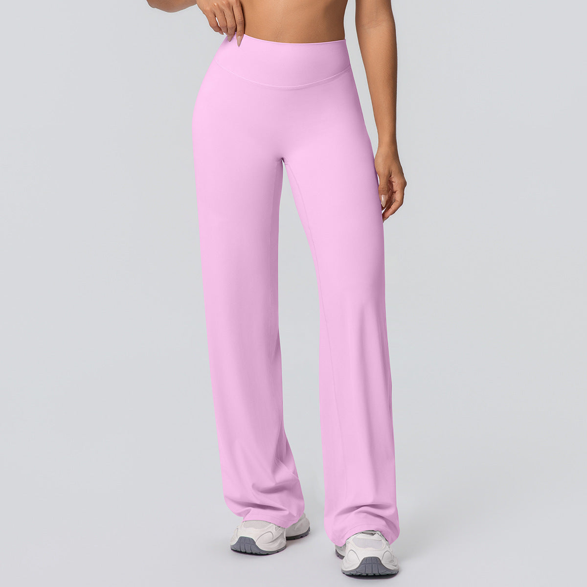 High-waisted loose-fit solid-color yoga pants with hip-hugging design for women