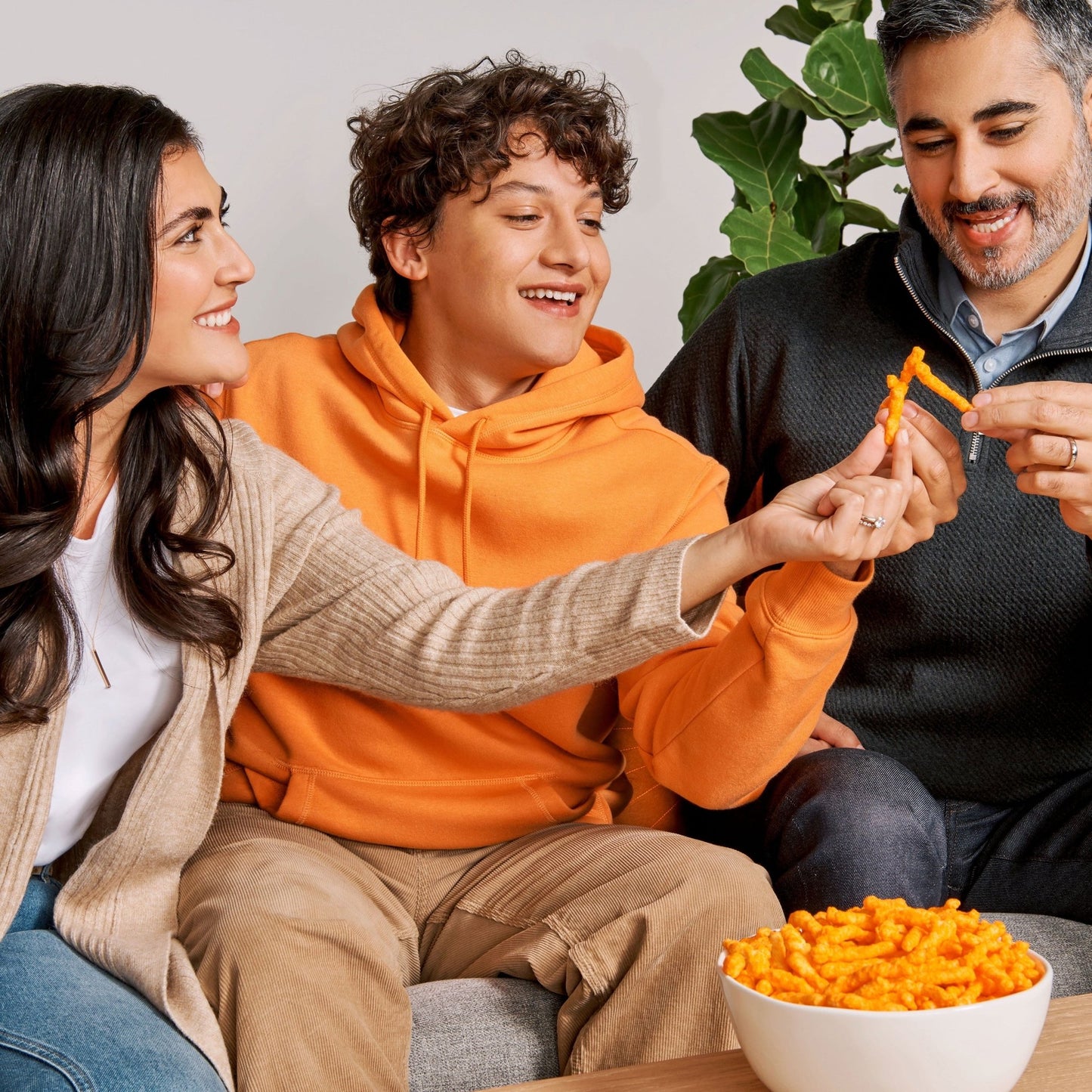 Cheetos Crunchy Cheese Flavored Snacks in a 15 oz bag, showing bright orange, crunchy cheese-flavored snack pieces.