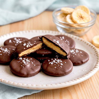Freeze-dried banana slices with chocolate coating from VFD.US, showcasing a crunchy, single-ingredient fruit snack.