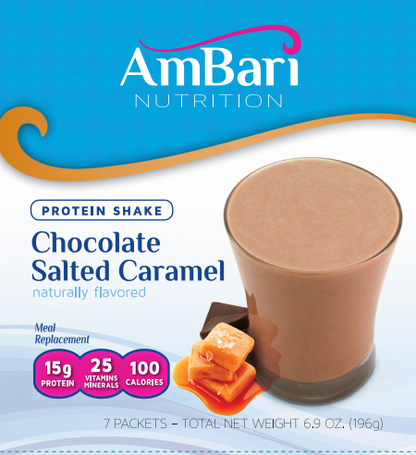 Creamy chocolate salted caramel shake by AmBari Nutrition in a glass with whipped cream and caramel drizzle on top.