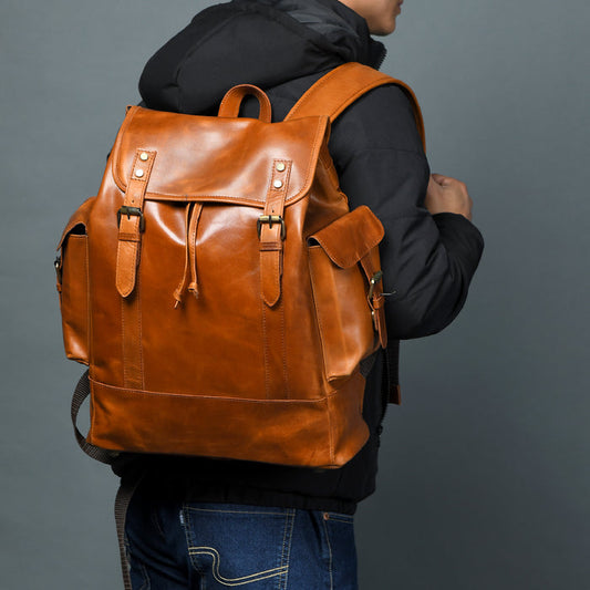 Earthen Leather Laptop Backpack by Classy Leather Bags, stylish brown leather backpack with multiple compartments and adjustable straps.