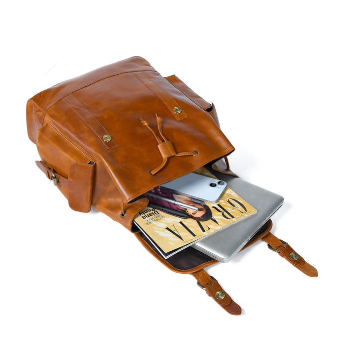 Earthen Leather Laptop Backpack by Classy Leather Bags, brown leather backpack with multiple compartments and adjustable straps.