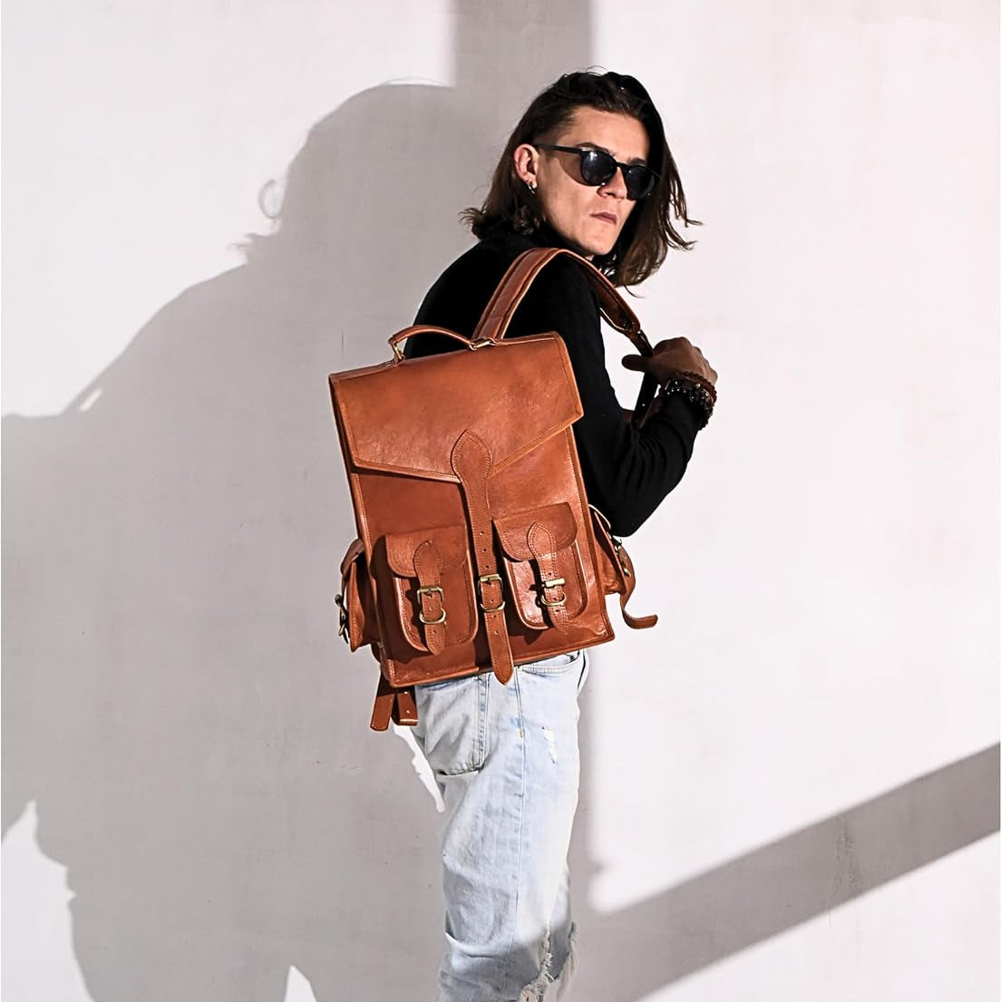 Vintage leather backpack rucksack from Classy Leather Bags, featuring a classic design with adjustable straps and multiple compartments.