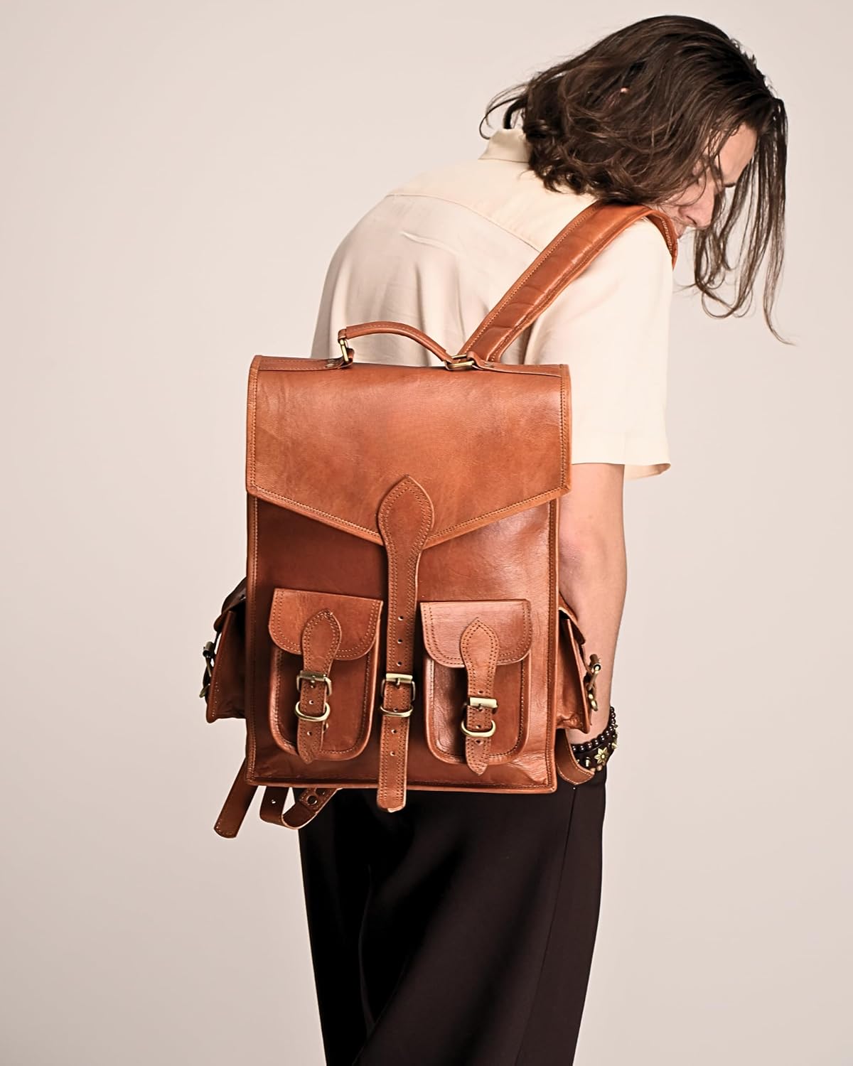 Vintage leather backpack rucksack by Classy Leather Bags with adjustable straps and classic design in brown leather.