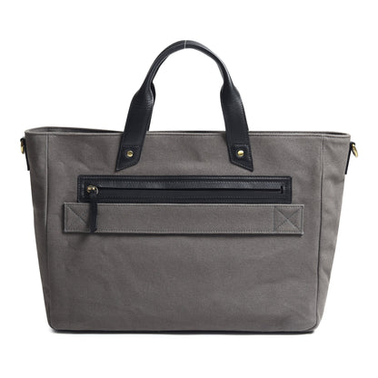 Gray Voyager Canvas Leather Briefcase by Classy Leather Bags, showing the sleek exterior with leather accents and sturdy handles.