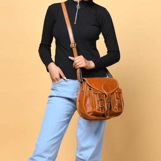 Classy Leather Bags 2-pocket leather sling bag for women, featuring a crossbody style with adjustable strap and compact design.