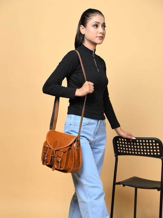 Classy Leather Bags 2-pocket leather sling crossbody bag for women with adjustable strap and compact design.